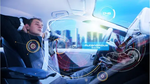 Getty Images Man in autonomous car