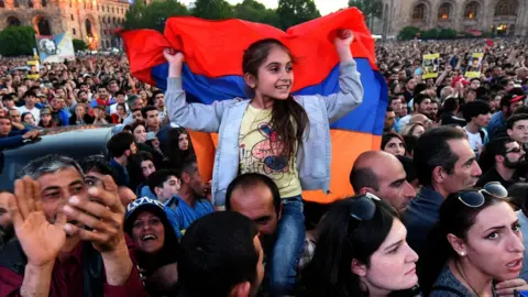 AFP Supporters of Armenia's protest leader Nikol Pashinyan attend a rally in downtown Yerevan on April 26, 2018