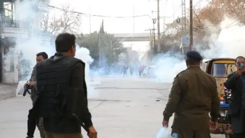 Getty Images Police intervene the protestors alleging rigging in the elections