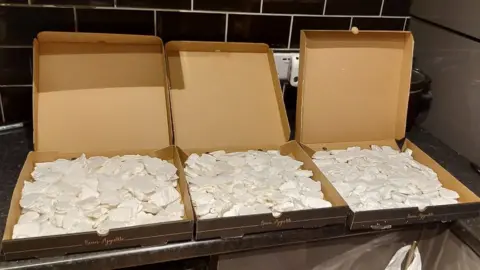Greater Manchester Police Cocaine in pizza boxes