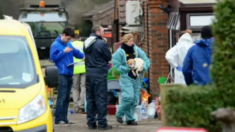 RSPCA officers removing dogs from 4 Paws vets and rescue centre
