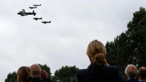 AFP/Getty Aircraft from the Battle of Britain Memorial Flight are flown in an air display to mark the Flight's 60th Anniversary at RAF Coningsby