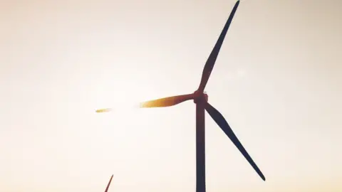 Getty Images Wind turbines