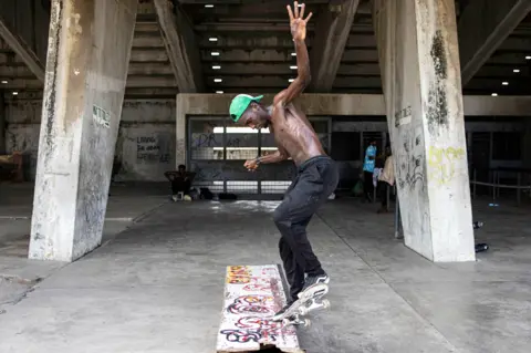 AFP A skateboarder in Lagos, Nigeria - Wednesday 1 March 2023