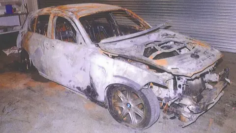 Crown Office Burnt-out BMW