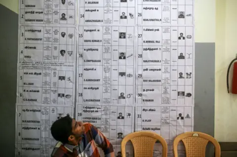 Getty Images Candidate's information displayed at a polling station during the first phase of voting for national elections in Chennai, Tamil Nadu, India, on Friday, April 19, 2024. Almost 1 billion Indians begin voting today in elections lasting more than six weeks, weighing up whether to hand Prime Minister Narendra Modi a third five-year term to continue his mix of economic and Hindu nationalist policies.