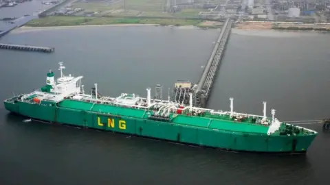 Getty Images A ship loads liquefied natural gas from the Nigerian Liquefied Natural Gas plant October 12, 2004 on Bonny Island, Nigeria