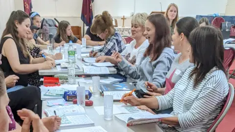 Shoel Stadlen English lessons to Ukrainians in Woodbridge, Suffolk