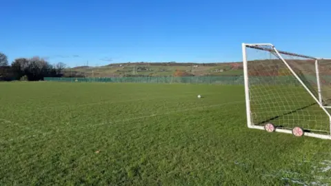 Stocksbridge Towns Fund An empty football pitch with a goal
