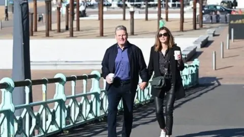 PA Media Sir Keir and his wife Victoria