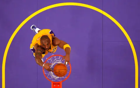 Lucy Nicholson / Reuters Kobe Bryant slam dunks against the Sacramento Kings during their NBA basketball game in Los Angeles in 2011.