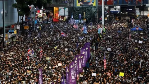 Reuters Anti-government protesters take to the streets of Hong Kong