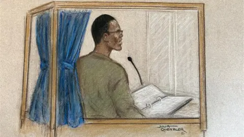 Julia Quenzler Court drawing of Ibrahima Bah in the witness box at Canterbury Crown Court, July 12th 2023