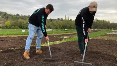 Will Gay and Ed Morrison gardening