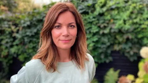 Stuart Woodward / BBC Gina Tilly, daughter of Clive Worthington