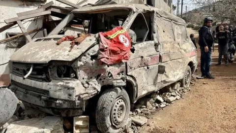 EPA Van wrecked in Israeli strikes on Habbariyeh