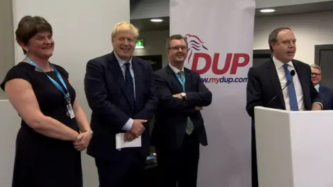 DUP members cheered Boris Johnson at the Conservative Party conference on 1 October