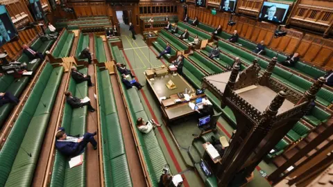 UK Parliament A sparse-looking House of Commons chamber