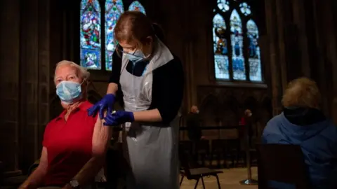 PA Media Geoffrey Beedle, 86, receives an injection of the Oxford/AstraZeneca coronavirus vaccine at Lichfield Cathedral