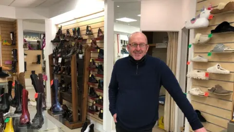 Rowberry Robert Jones in his Oxford Street store in Swansea