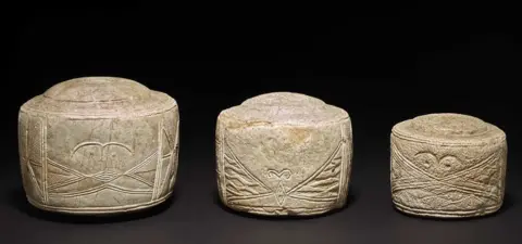 Trustees of the British Museum/PA Late Neolithic carved chalk cylinders