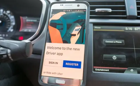 Getty Images The Uber drivers app displayed on a mobile phone