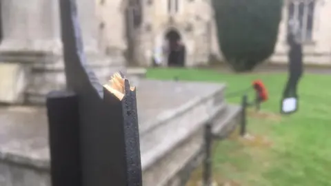 Broken wooden statues