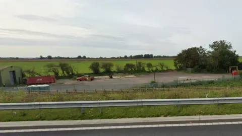 Google FCC Environment site in Buckden, as seen from the westbound carriageway of the A14