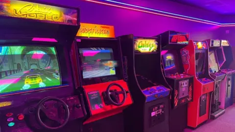 Andrew Turner/BBC An array of retro video games