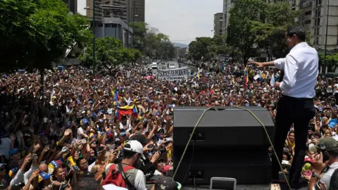 AFP Juan Guaido attends a rally in Venezuela