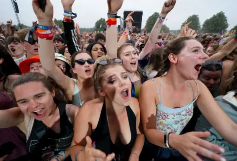 PA Media Festival goers at Latitude festival in Henham Park, Southwold, Suffolk