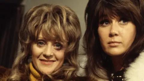 BBC Polly James as Beryl Henderson and Nerys Hughes as Sandra Hutchinson in The Liver Birds