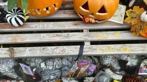 Family handout The vandalised memorial bench in Gornal Wood Crematorium