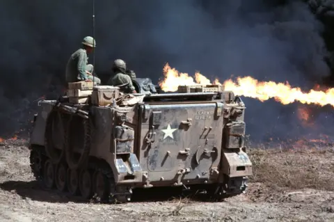 Swanson Photographic Archive, UT Austin  An armoured personnel carrier with a flamethrower during a deforestation mission outside the city of Ben Suc in Vietnam in 1966.