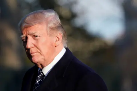 Reuters US President Donald Trump walks on the South Lawn of the White House upon his return to Washington, US, after spending the weekend in Mar-a-Lago estate in Palm Beach, Florida, 25 March 2018