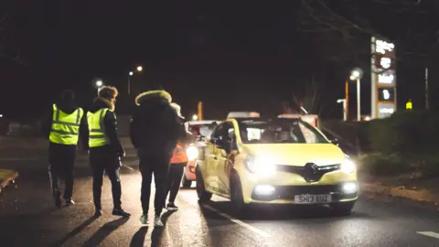 Louis Hervey Cars in a car park in Shrewsbury