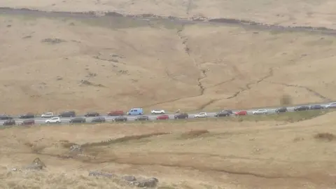 Snowdonia National Park Authority  Car lined the road at Pen y Gwryd