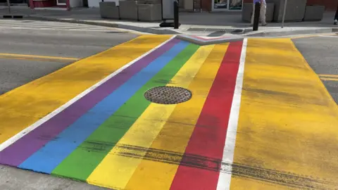 Emma Elsworthy Paris's damaged Pride pedestrian crossing