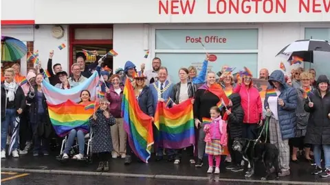 New Longton & Whitestake Community People staging Pride rally outside a post office