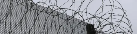 Barbed wire on a prison fence