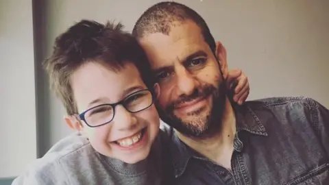 National Autistic Society Matt Davis and his son Isaac