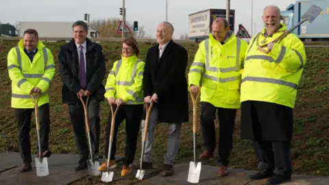 John Fairhall/BBC Ground-breaking ceremony at the Black Cat junction, near Bedford