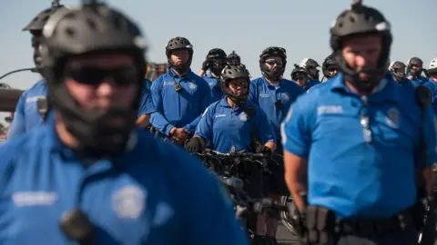 Getty Images Police blocked protesters from entering the highway to disrupt traffic