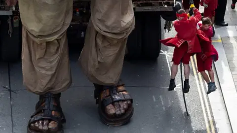 PA puppeteers operate giant