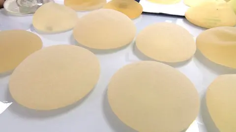 Some textured breast implants