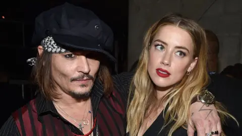 Getty Images Johnny Depp and Amber Heard at The Grammys