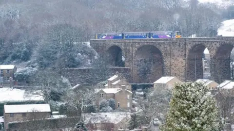Getty Images A train crosses the viaduct in Denby Dale, northern England