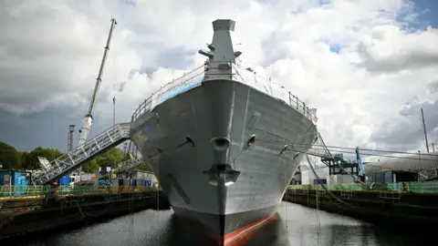 An under-construction City Class Type 26 frigate HMS Glasgow is seen in the dock.