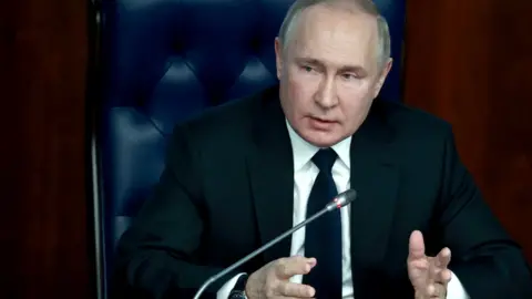 Reuters President Putin said Russia would not militarise the country's economy