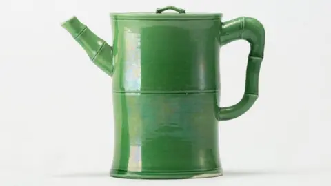 The Butler Collection Green-glazed porcelain wine pot with bamboo-shaped handle and spout
